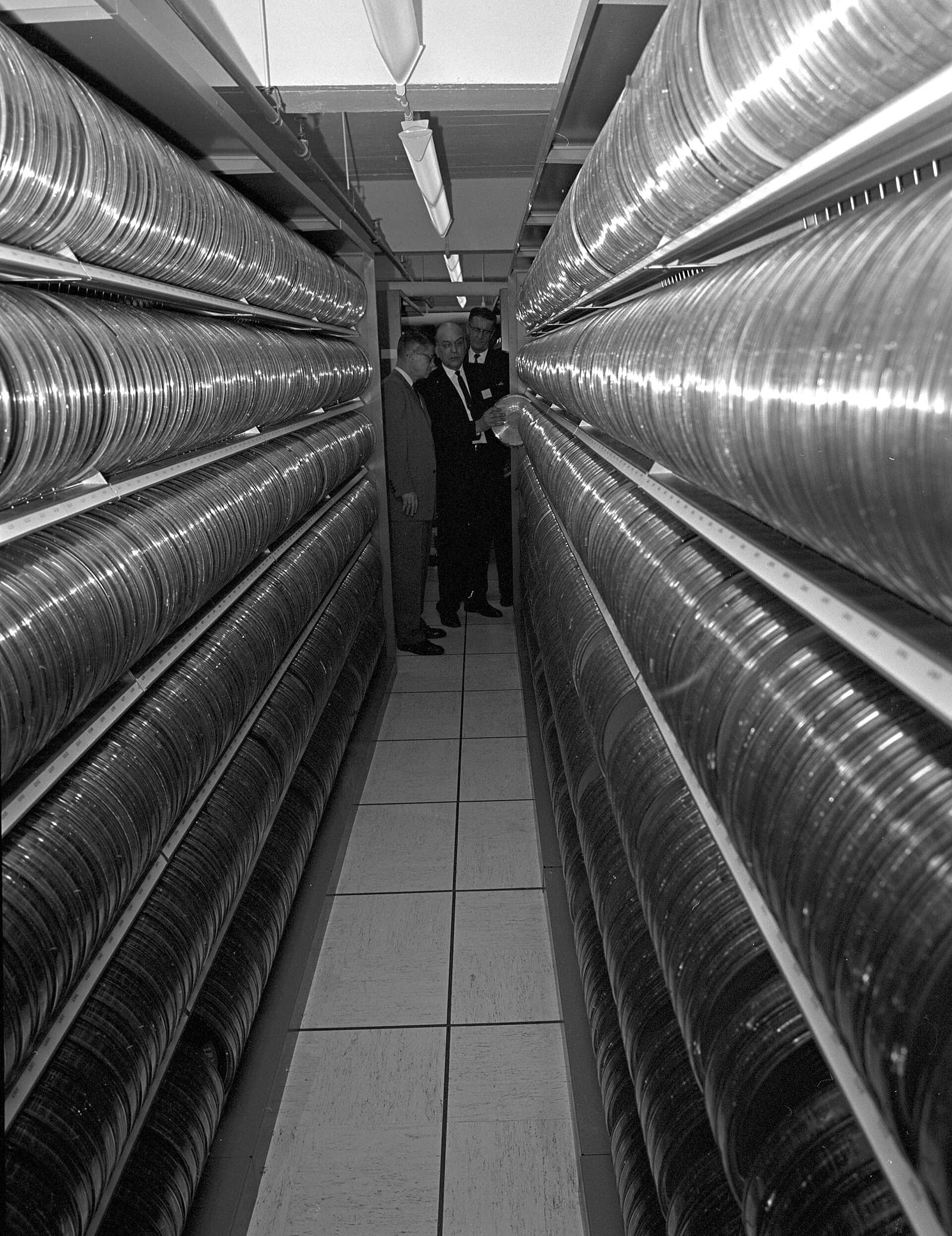 A 1966 tape library: two walls of data reels on shelves